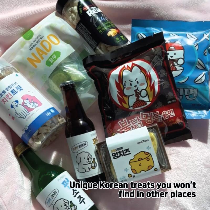 Real flat-lay of imported Korean dog treats from a monthly box.
